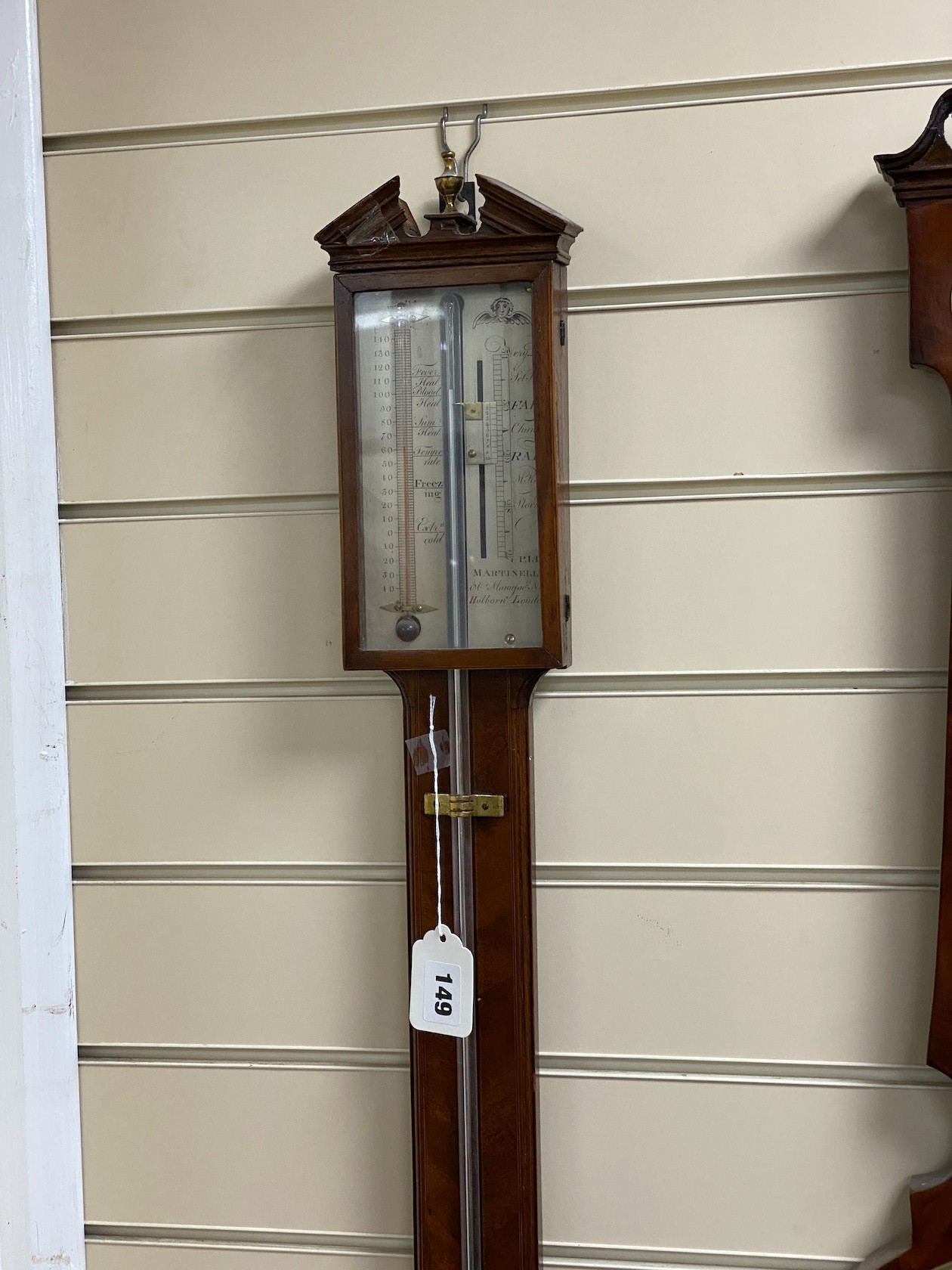 A George III mahogany stick barometer, marked Martin Elly, London, height 92cm